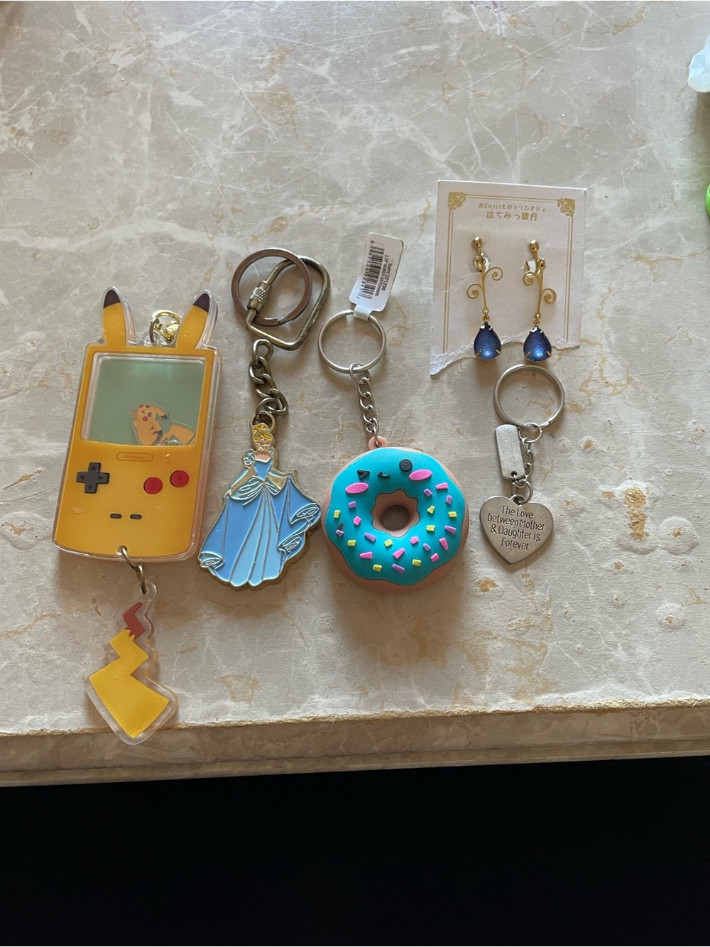 Pokemon Yellow Pikachu Game Console Keychain with Blue Donut Charm